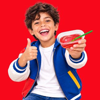 Boy with candy in pop-art composition, red background